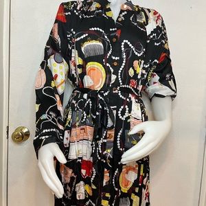 Colorful ladies top. NWT comes in various sizes